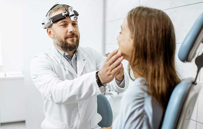 ENT specialist examining a patient’s ear at IASSIS Medical Zakynthos