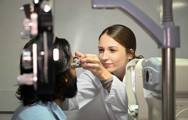 Ophthalmologist examining patient's eyes at IASSIS Medical Zakynthos