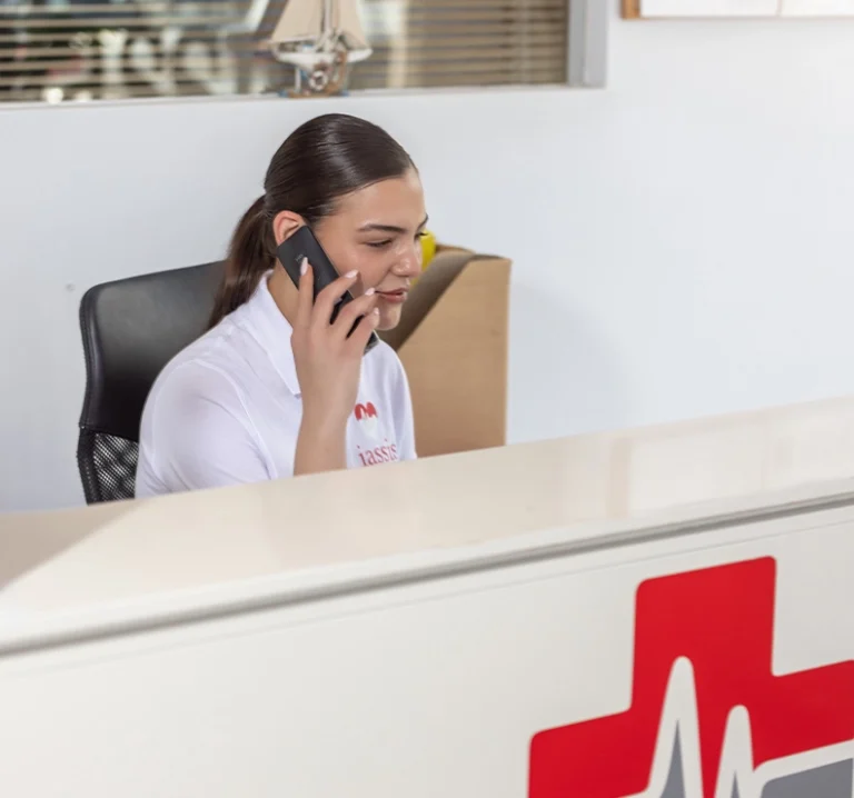 Doctor speaking on emergency helpline at IASSIS Medical Zakynthos