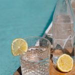 Drink tap water in Zakynthos - glass with lemon by a pool