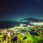 Night view of Zakynthos Town and coastline from a nearby hilltop