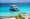 Tourist boat anchored near a turquoise beach in Zakynthos, Greece