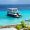 Tourist boat anchored near a turquoise beach in Zakynthos, Greece