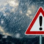 Warning sign during heavy rain – September weather Zakynthos