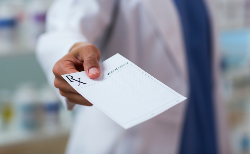 Tourist getting a prescription in Zakynthos from a doctor