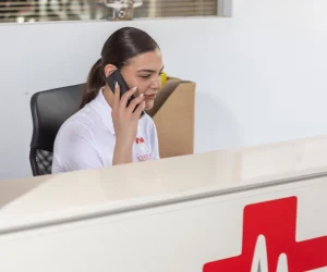 Doctor speaking on emergency helpline at IASSIS Medical Zakynthos